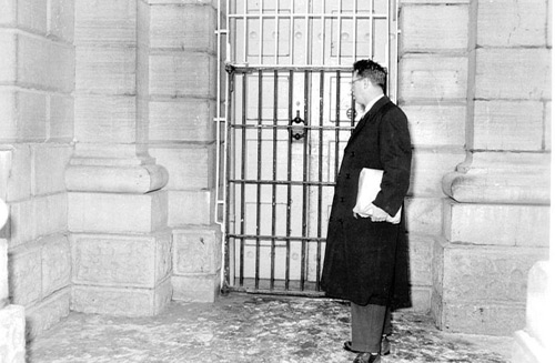 Bill McCabe, Executive Director of Kingston at the gates of Kingston Penitentiary