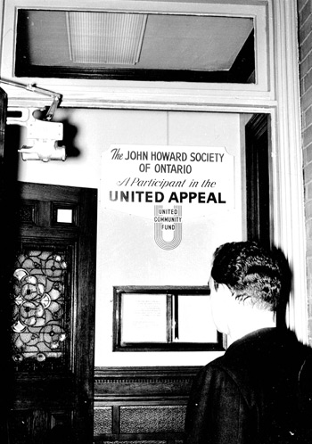 A Client visiting the John Howard Society of Ontario office at Isabella Street, Toronto, Ontario – The “United Way” was formerly known as the “United Appeal”