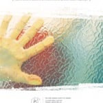 Cover of JHSO Annual Report 2006 with a hand pushed up on glass