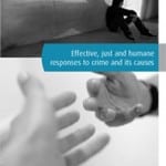 Cover of JHSO Annual Report 2009 with a man sitting against a wall and a hand reaching out