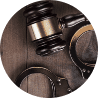 A gavel and handcuffs