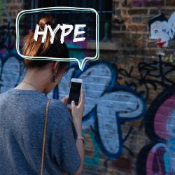 text bubble reading hype coming from a persons phone